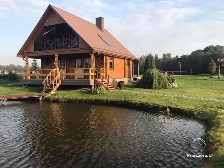 Birutės sodyba - 4 nameliai, 4 pokylių salės, pirtelė, kubilas