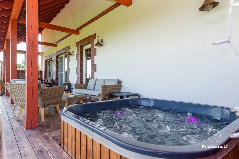 Kaimo turizmo sodyba Minijos Apžavai: džiakuzi, pirtis, irklenčių nuoma, žaidimų aikštelė vaikams